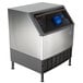 A Manitowoc undercounter ice machine with blue ice on top.