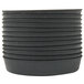 A stack of black Matfer Bourgeat Exoglass cake pans.