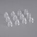 A clear plastic cone-shaped container holding 10 Matfer Bourgeat interchangeable pastry tips.