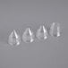 A clear plastic cone shaped container holding Matfer Bourgeat pastry tips.