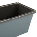 A Matfer Bourgeat flared steel bread loaf pan with a black handle.