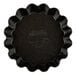 A black Matfer Bourgeat fluted tartlet mold.