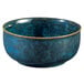 A Oneida Studio Pottery Blue Moss porcelain cereal bowl with black speckles.