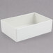 A white rectangular Bon Chef bowl with a sandstone finish.