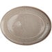 An Oneida Terra Verde Natural porcelain oval platter with a speckled design.