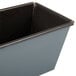 A close-up of a black metal Matfer Bourgeat bread loaf pan with grey non-stick coating.