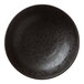 A black porcelain pedestal bowl with speckled specks on the surface.