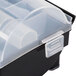 A plastic National Checking Company day of the week label dispenser on a counter.
