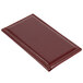 A burgundy leather Menu Solutions guest check presenter with stitching.