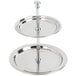 An American Metalcraft stainless steel two tiered display stand holding two round plates.