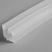 A white plastic strip with a gray surface.