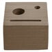 A weathered walnut wood block check presenter with a circle cutout.