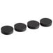 A row of four black Galaxy rubber feet with round black caps.