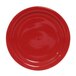 A red Tuxton Healthcare China plate.