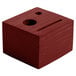 A mahogany wood block check presenter with a hole on the face.
