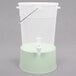 A translucent plastic beverage dispenser with a white lid and cucumber base.
