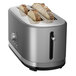 A KitchenAid toaster with two slices of bread in it.