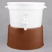 A close-up of a white and brown Choice beverage dispenser with a brown base.