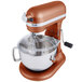 A copper KitchenAid Pro 600 series mixer with a bowl.