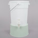 A white plastic Choice beverage dispenser with a green cucumber base and a handle.