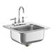An Advance Tabco stainless steel drop-in sink in a counter.