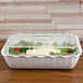 a glass container with food in it
