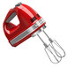 A red KitchenAid 9-speed hand mixer with silver accents.