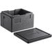 A black plastic container with a lid and a Cambro logo on a table.