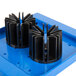 A blue plastic tray with black metal pieces and a black plastic object.