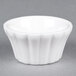 A CAC Bone White China floral ramekin with a ribbed rim.