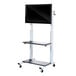 A Luxor black TV cart with a flat screen on it.