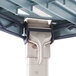A close-up of a white and blue MetroMax Q pole.