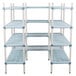 A white MetroMax shelving unit with blue shelves.