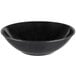 A black Vollrath melamine serving bowl.