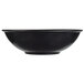 A black Vollrath melamine round serving bowl.