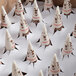 A box of Dutch Treat sugar cones with a brown and white jacket with a drawing on it.