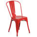 A red Flash Furniture outdoor restaurant chair with a slat seat and back.