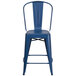 A Flash Furniture blue metal counter height stool with a vertical slat back and drain hole seat.