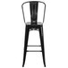A Flash Furniture black galvanized steel bar stool with a vertical slat back.