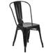 A black metal Flash Furniture outdoor restaurant chair with a slat back.