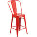 A red metal Flash Furniture counter height stool with a square seat and vertical slat back.