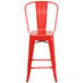 A red metal Flash Furniture counter height stool with a backrest and vertical slat design.