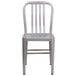 A Flash Furniture silver metal chair with a vertical slat back.