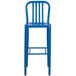 A blue metal Flash Furniture bar stool with a vertical slat back.