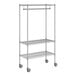 A Regency chrome wire garment rack on wheels.