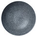 A circular black and white porcelain bowl with a spiral design.