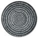 A white porcelain saucer with a black spiral design.