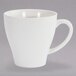 A white porcelain coffee cup with a handle.