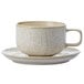 A Oneida Knit porcelain saucer with a tan rim.