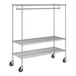 A chrome wire garment rack on wheels.